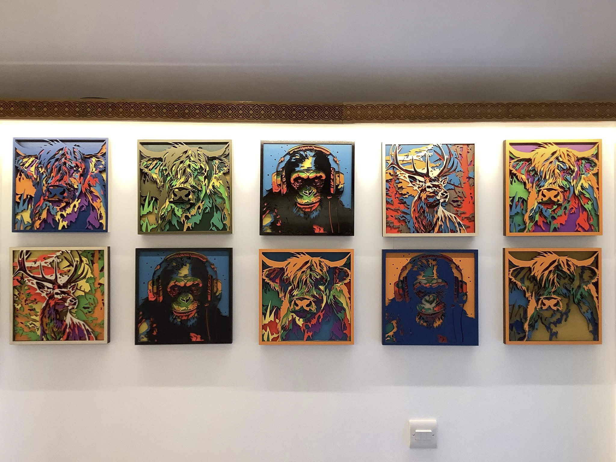Colourful Highland artwork in Woodpecker Lochgoilhead
